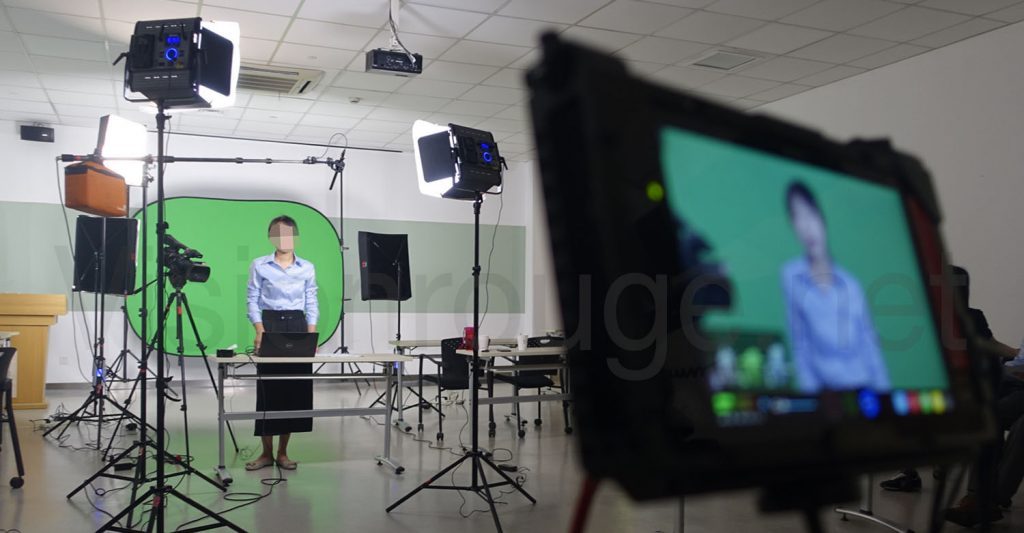 Green-screen-backdrop-TelePrompter-operator-corporate-video-in-Shanghai